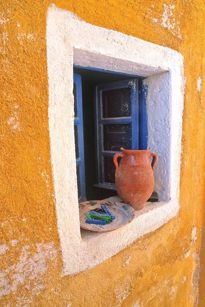 Greece, Santorini, Oia. Pottery in window.  by Jaynes Gallery framed canvas print