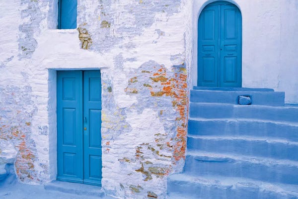 Greece, Symi. Blue doors and stairway of house.