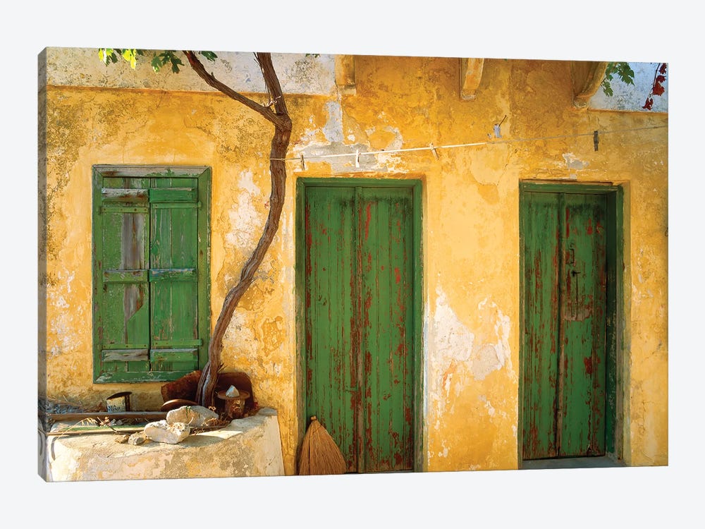 Greece, Symi. Yellow house with green doors. Jim Nilsen, Jaynes Gallery, nobody, travel, tourism by Jaynes Gallery 1-piece Canvas Wall Art