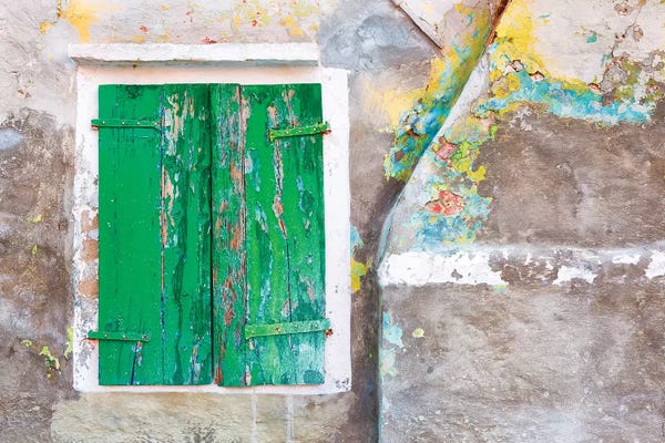 Italy, Burano. Close-up of weathered window shutters.