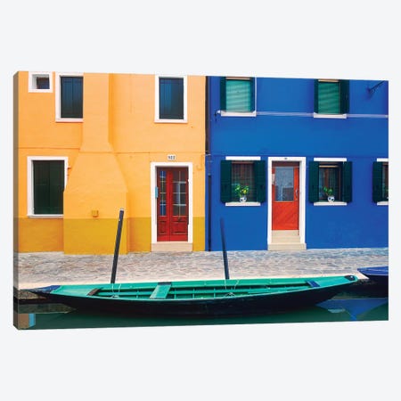 Italy, Burano. Colorful house exteriors and boat in canal.  Canvas Print #JYG265} by Jaynes Gallery Canvas Art