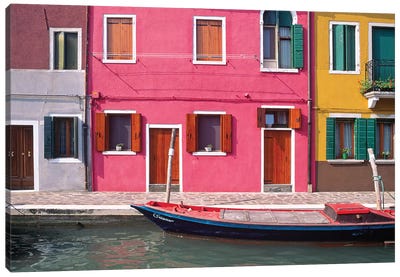 Italy, Burano. Colorful house exteriors and boat in canal.  Canvas Art Print - Burano