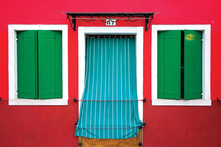 Italy, Burano. Colorful house windows and walls. 