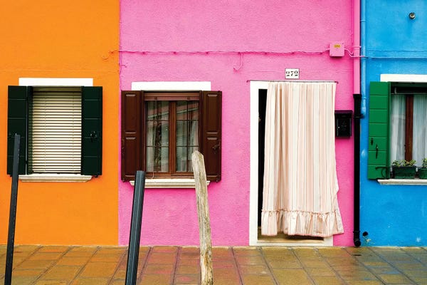 Italy, Burano. Colorful house windows and walls.