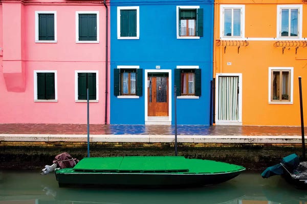 Italy, Burano. Colorful windows and walls.
