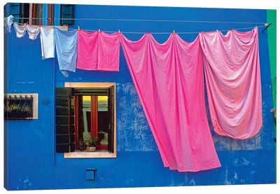 Italy, Burano. Drying laundry and colorful window and wall.  Canvas Art Print - Burano