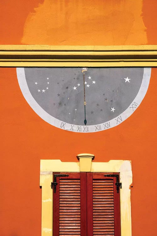 Italy, Lago di Orta. Calendar on wall above doorway. 