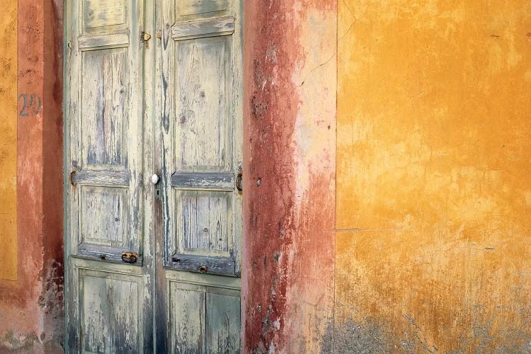 Italy, Lipari. Weathered wall and door. 