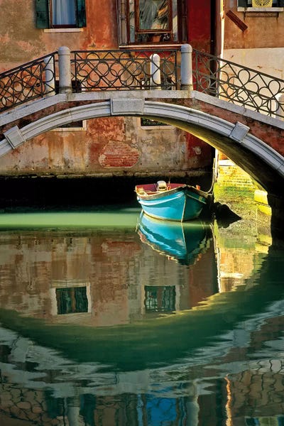Italy, Venice. Canal bridge and building.