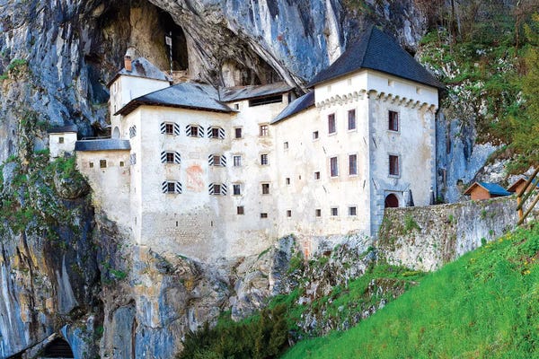 Slovenia, Predjama Castle. Castle built into mountain wall.