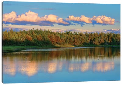 Canada, New Brunswick, Richibucto. Clouds reflected in an inlet at sunset. Canvas Art Print