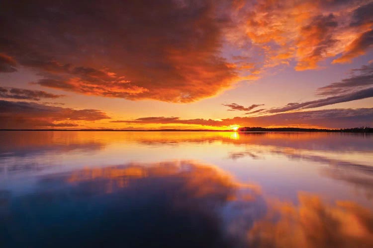 Canada, Ontario, Pakwash Lake Provincial Park. Clouds reflected in Pakwash Lake at sunset.