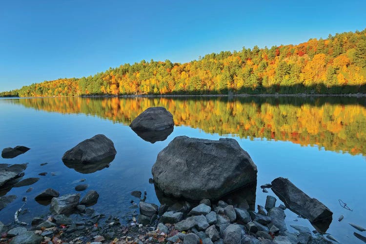 Canada, Ontario. Autumn reflections on St. Nora Lake.