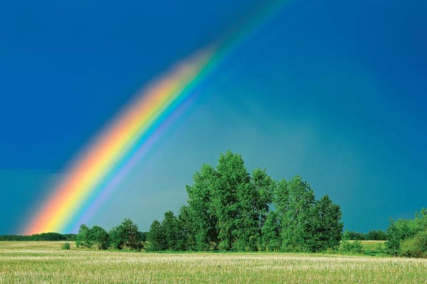 Canada, Saskatchewan, Wroxton. Rainbow over grassland.