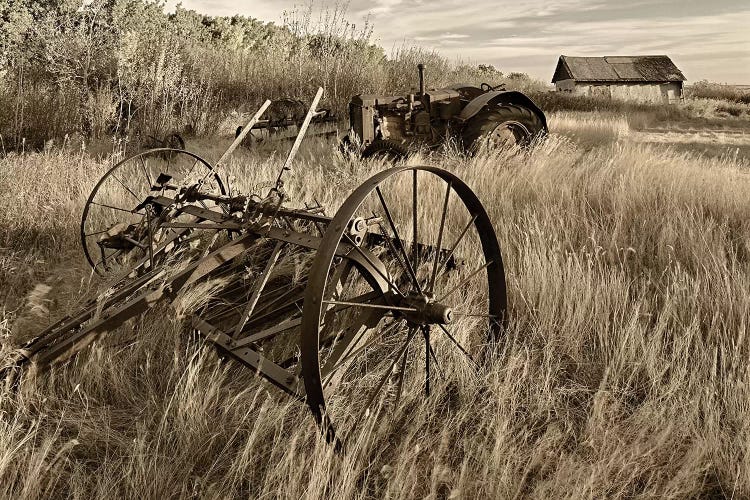 Canada. Sepia Photo Of Old Farm Machinery In Field.