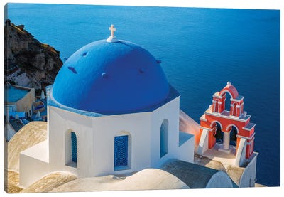 Greece, Oia. Greek Orthodox church and ocean.  Canvas Art Print - Blue Domed Church Santorini