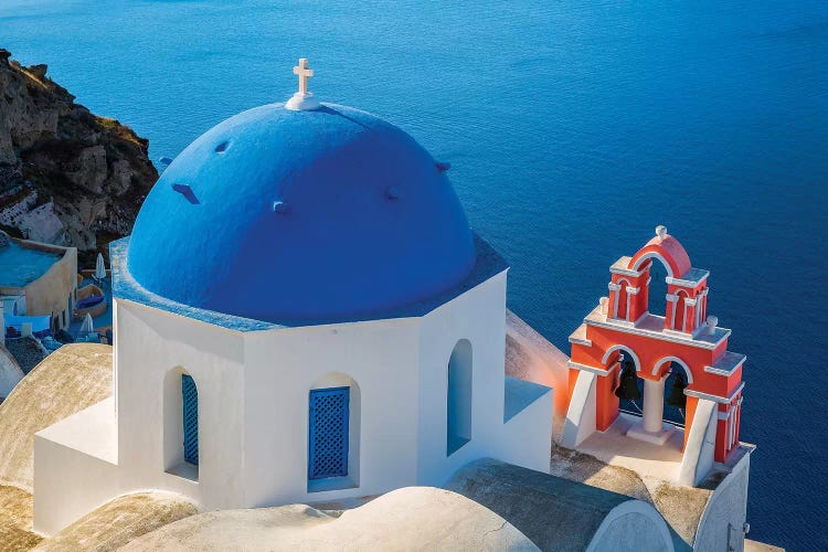 Greece, Oia. Greek Orthodox church and ocean. 