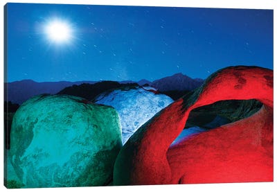 USA, California, Alabama Hills. Mobius Arch and rocks lit with colors on moonlit night. Canvas Art Print - Sierra Nevada Art