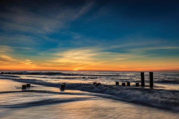 New Jersey: USA, New Jersey, Cape May National Seashore. Sunrise on winter shoreline.  by Jaynes Gallery