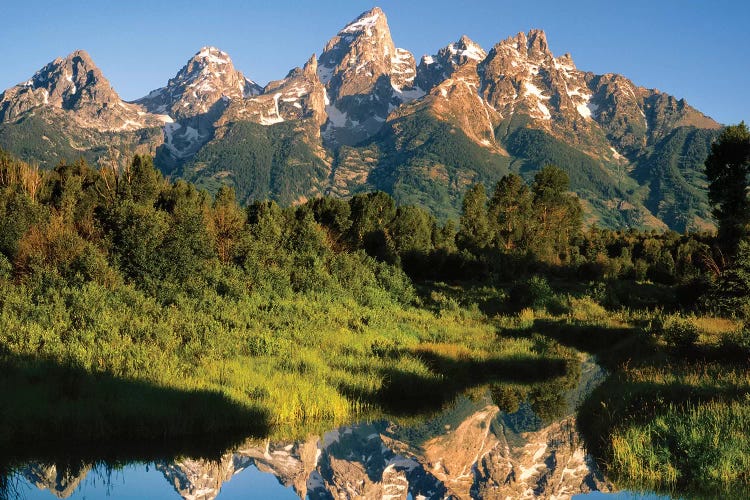 USA, Wyoming, Grand Teton National Park. Grand Tetons reflect in Snake River.