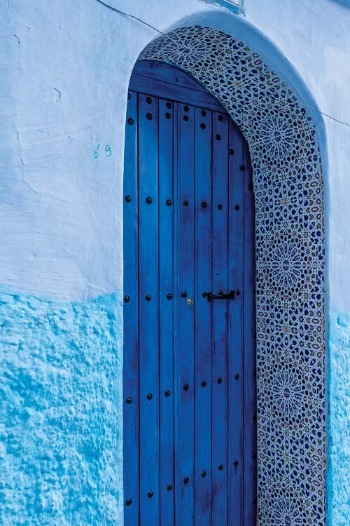 Africa, Morocco, Chefchaouen. Arch Over Wooden Door.