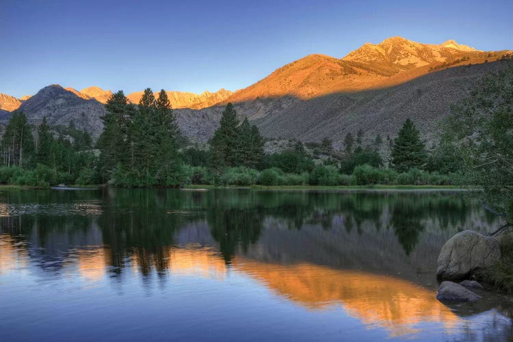 USA, California, Bishop. Sunrise on mountain lake.