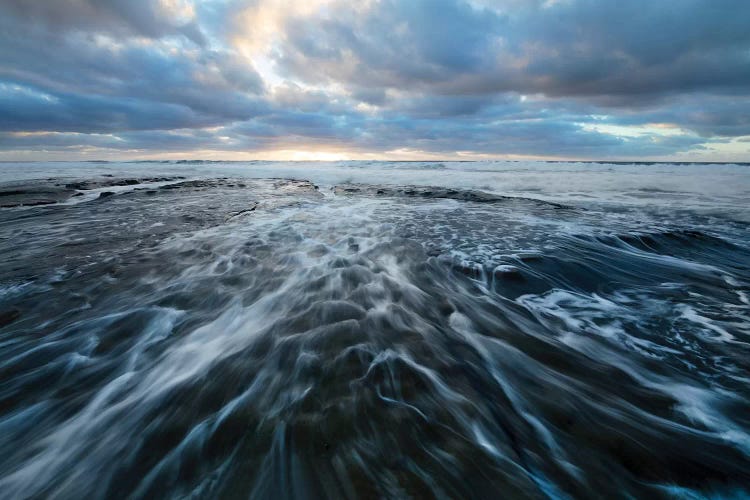 USA, California, La Jolla. Sunset over beach and tide pools.