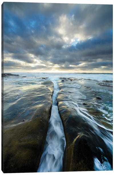 USA, California, La Jolla. Wave flows through cracked sandstone. Canvas Art Print - San Diego Art