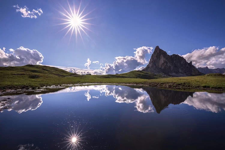 Italy, Dolomites, Giau Pass. Sun Reflection In Mountain Tarn.