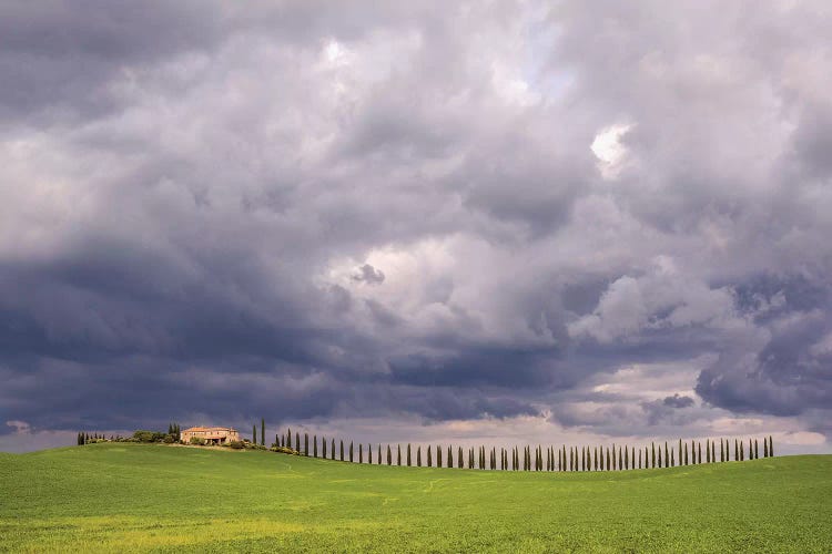 Italy, Tuscany, Val D'Orcia. Farmhouse And Storm Clouds At Sunset.