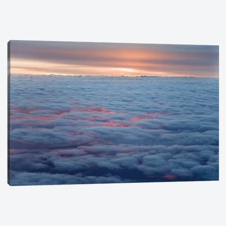 Sunrise From An Airliner Looking Down At Clouds. Canvas Print #JYG994} by Jaynes Gallery Canvas Art