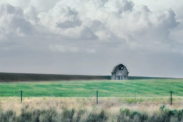 The Old Barn Under The Clouds