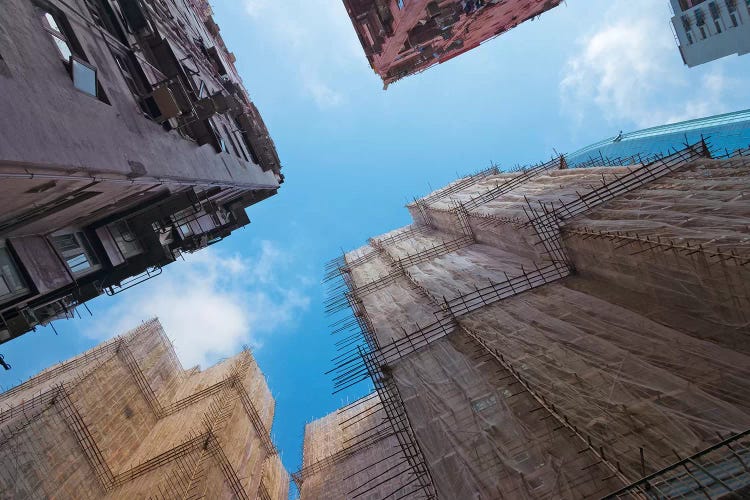 Scaffolding around the residential buildings for renovation in Quarry Bay, Hong Kong, China