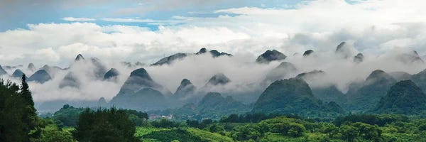 Guangxi: Limestone hills in mist, Xingping, Yangshuo, Guangxi, China by Keren Su