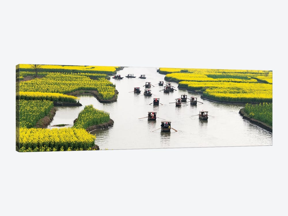 Rowing boat on river through Thousand-Islet canola flower fields, Xinghua, Jiangsu Province, China by Keren Su 1-piece Canvas Art Print