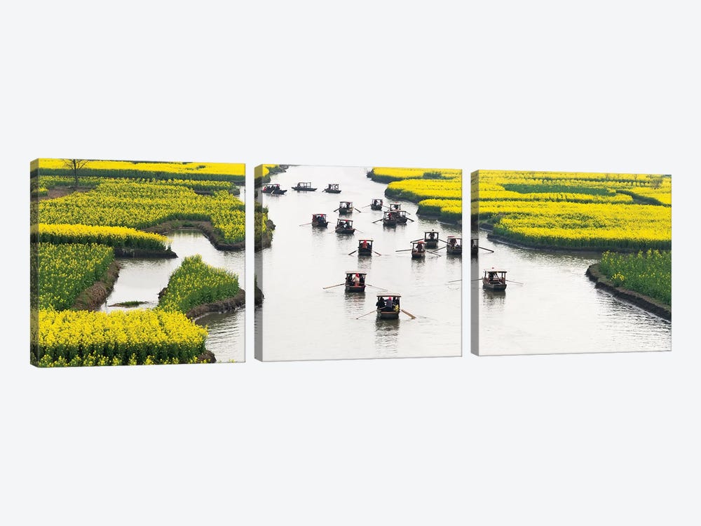 Rowing boat on river through Thousand-Islet canola flower fields, Xinghua, Jiangsu Province, China by Keren Su 3-piece Canvas Print