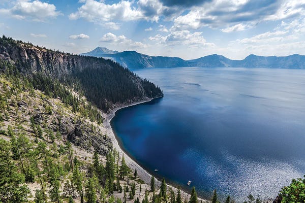 Lucas Moore: Blue Skies Over Crater Lake by Lucas Moore