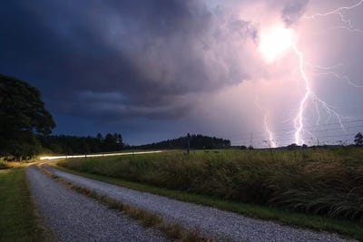 Purple Strike by Lucas Moore framed canvas print