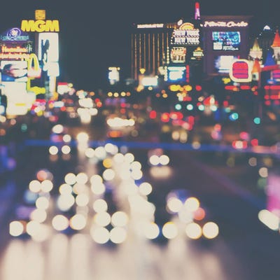 The Neon Town by Laura Evans framed canvas print