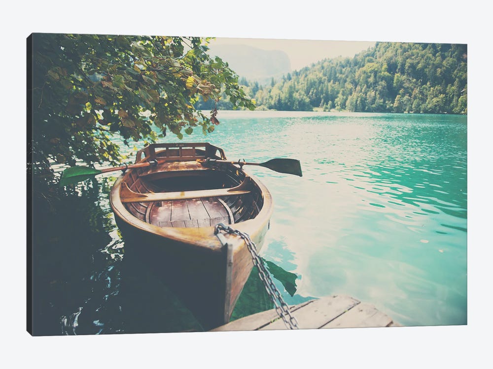 A Row Boat On Lake Bled In Slovenia by Laura Evans 1-piece Canvas Art Print