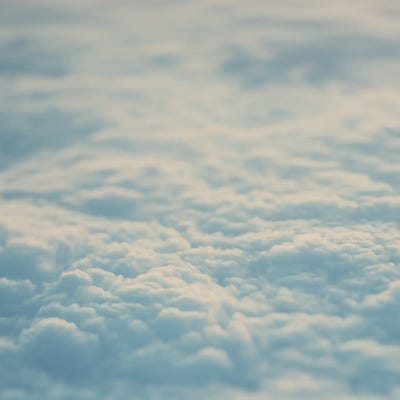 Above The Clouds by Laura Evans framed canvas print