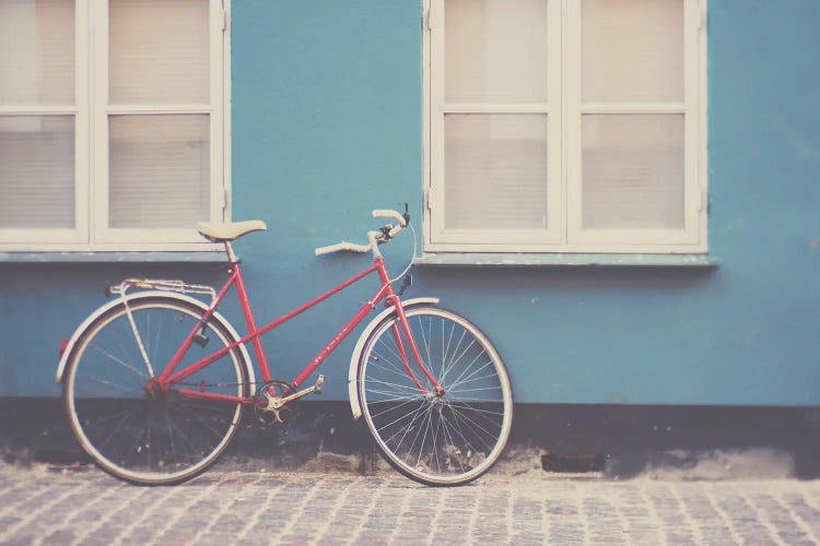 A Pretty Red Bicycle On The Streets Of Copenhagen