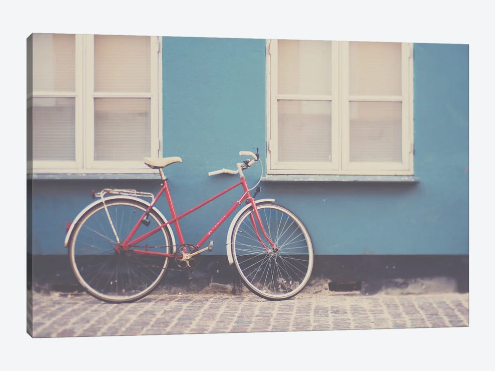 A Pretty Red Bicycle On The Streets Of Copenhagen by Laura Evans 1-piece Canvas Print
