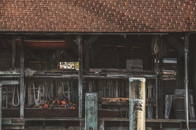 Tied And Tethered Boat House by Louis Ruth framed canvas print