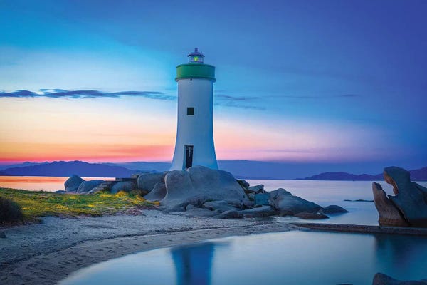 Cloudy Sunsets: Palau Lighthouse by Marco Carmassi