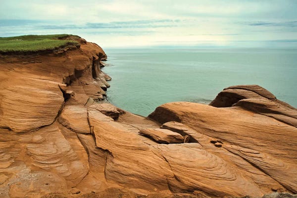 Canada, Quebec, Iles-De-La-Madeleine. Red Cliffs And Ocean