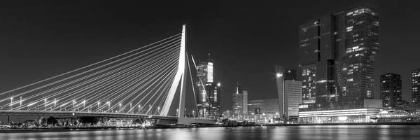 Rotterdam: Rotterdam Gigantic Erasmus Bridge At Night - Monochrome Panorama by Melanie Viola