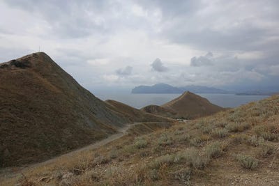 Hilly Landscape By The Sea by Mike Kiev canvas print
