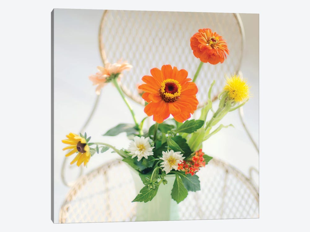 Orange Flowers On Iron Chair by Mandy Lynne 1-piece Canvas Print
