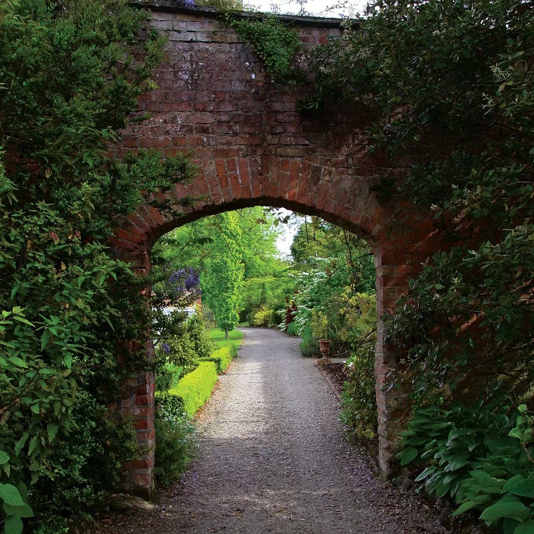 Ireland, The Dromoland Castle Very Green Walled Garden Path Through A Brick Archway.